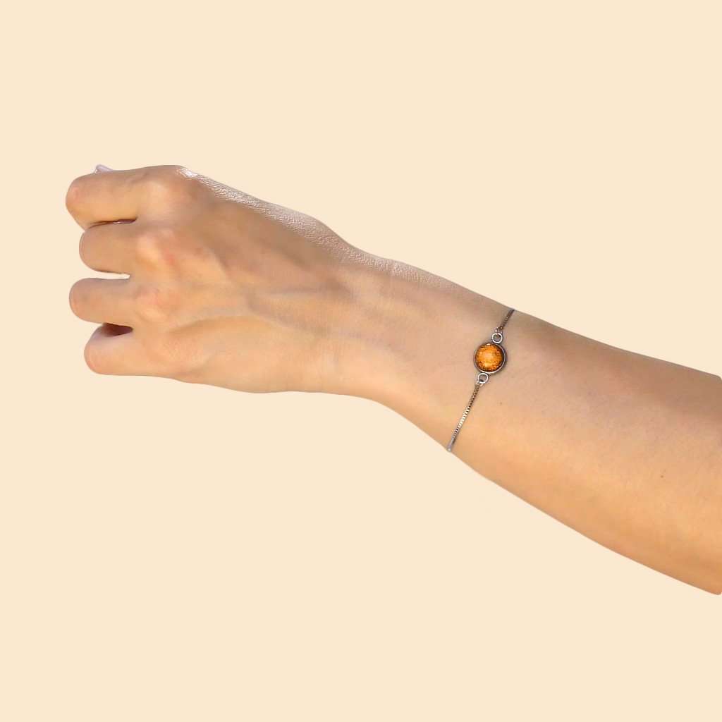 BRACELET ORANGE GOLD ~ CRYSTAL GREEN | ST. STEEL | PERFECT FIT | REFLE[proBRACELET ORANGE GOLD ~ CRYSTAL GREENduct_vendor]MicrocosmosPRODUCT INFORMATION

Exclusive Microcosmoses Glass Reflet™
Base: Stainless Steel Perfect Fit adjustable slide closure up to 9", 22 cm.

Bracelet chain thickness 2 mmBRACELET STEEL