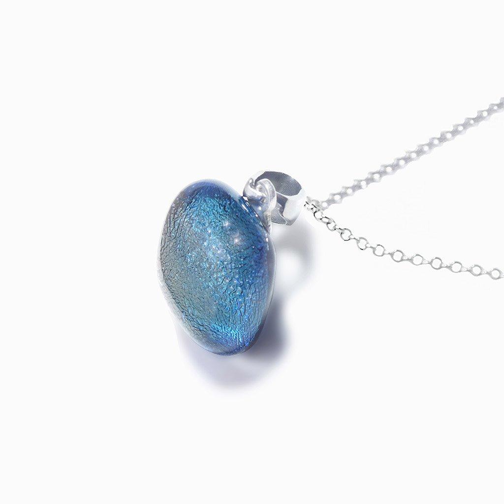 NECKLACE SILVER PEARL ~ AQUA | SQUIRCLE | REFLET[proNECKLACE SILVER PEARL ~ AQUAduct_vendor]MicrocosmosPRODUCT INFORMATION

Exlusive Microcosmoses Glass Reflet
Bead size length: 14 mm / 0.55" |  width: 14 mm / 0.55"

Base chain: Sterling Silver 925 ~ Stainless Steel 
NECKLACE